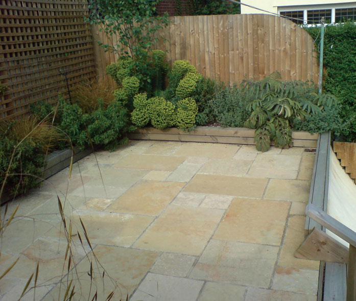 'Tuscan' limestone paving.