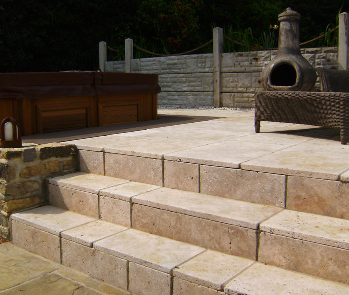 'Cream' travertine paving and steps.