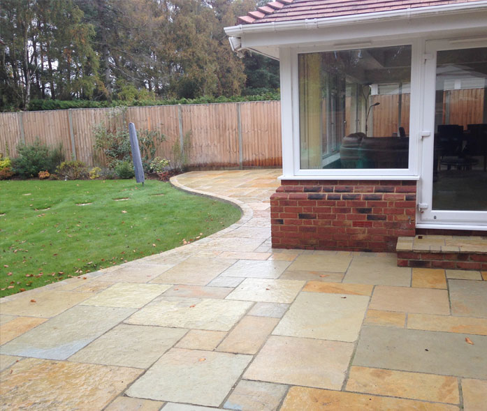 'Tuscan' limestone paving.