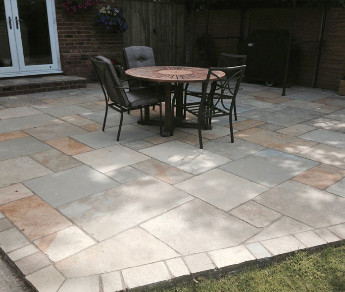 'Tuscan' limestone paving.