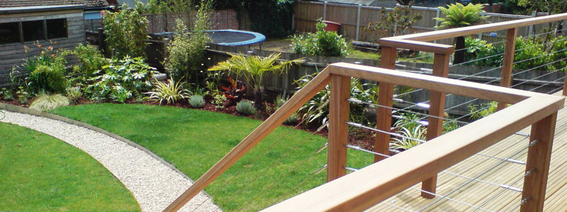 Raised decking area over looking garden and gravel path